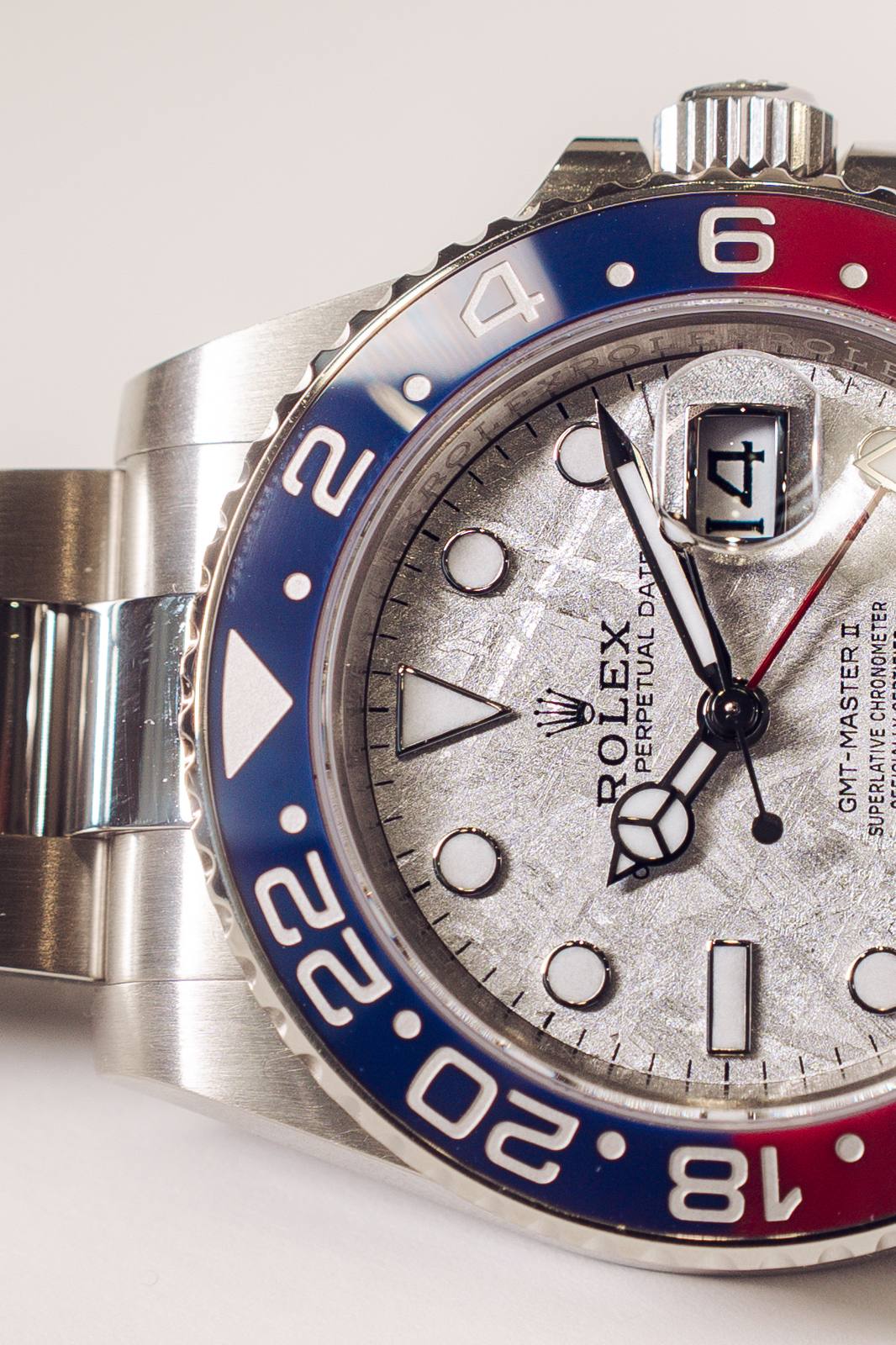 Macro of a Rolex GMT-Master II meteorite dial and Pepsi bezel