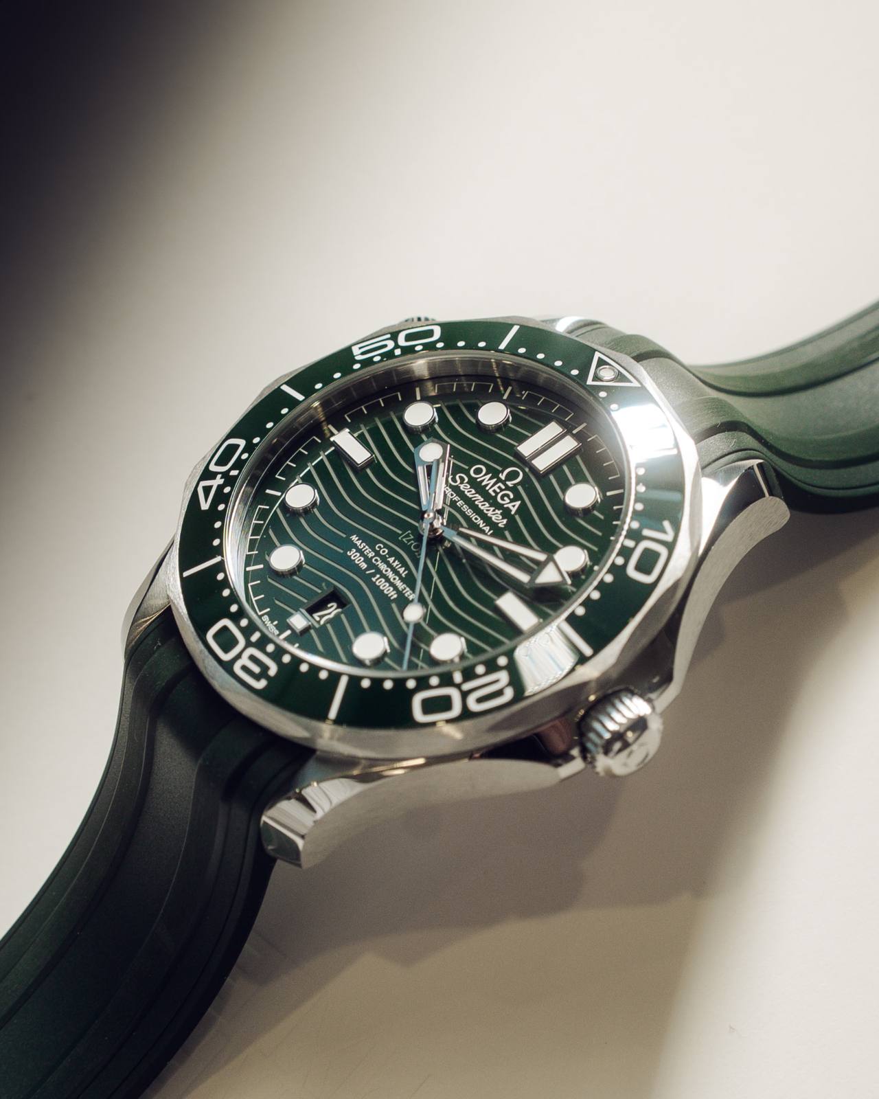 Omega Seamaster Diver 300M green ceramic bezel at an angle