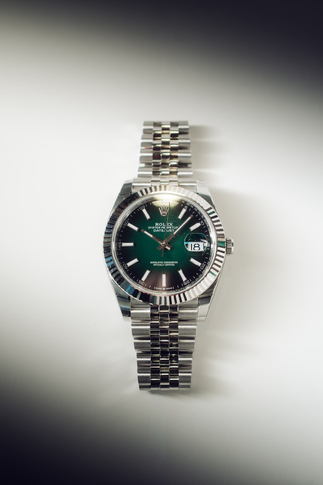 Rolex Datejust 41 green dial photographed full length on Jubilee